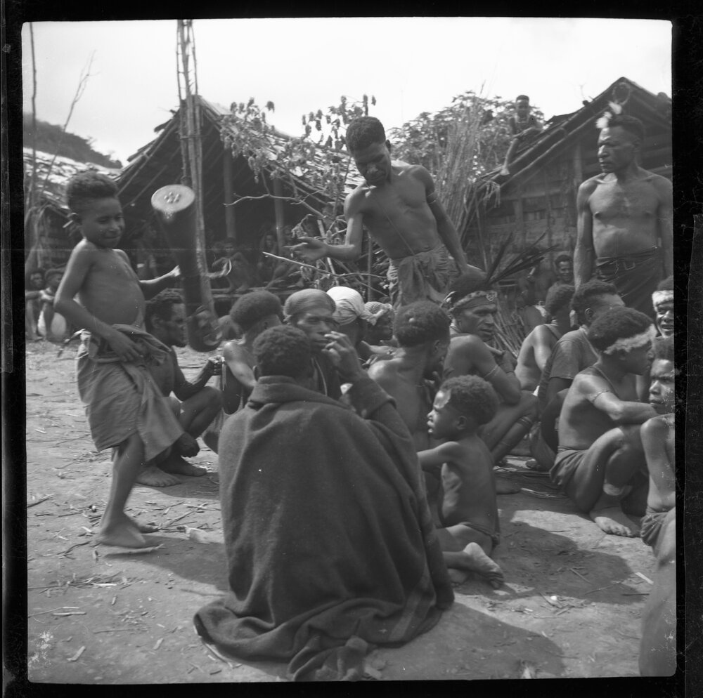Group Sitting in Mountainside Village