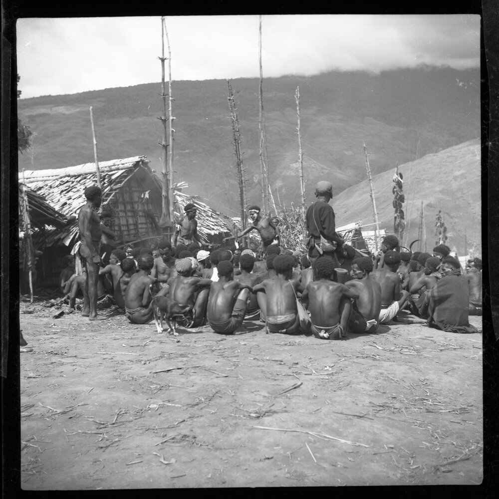 Group Sitting in Mountainside Village