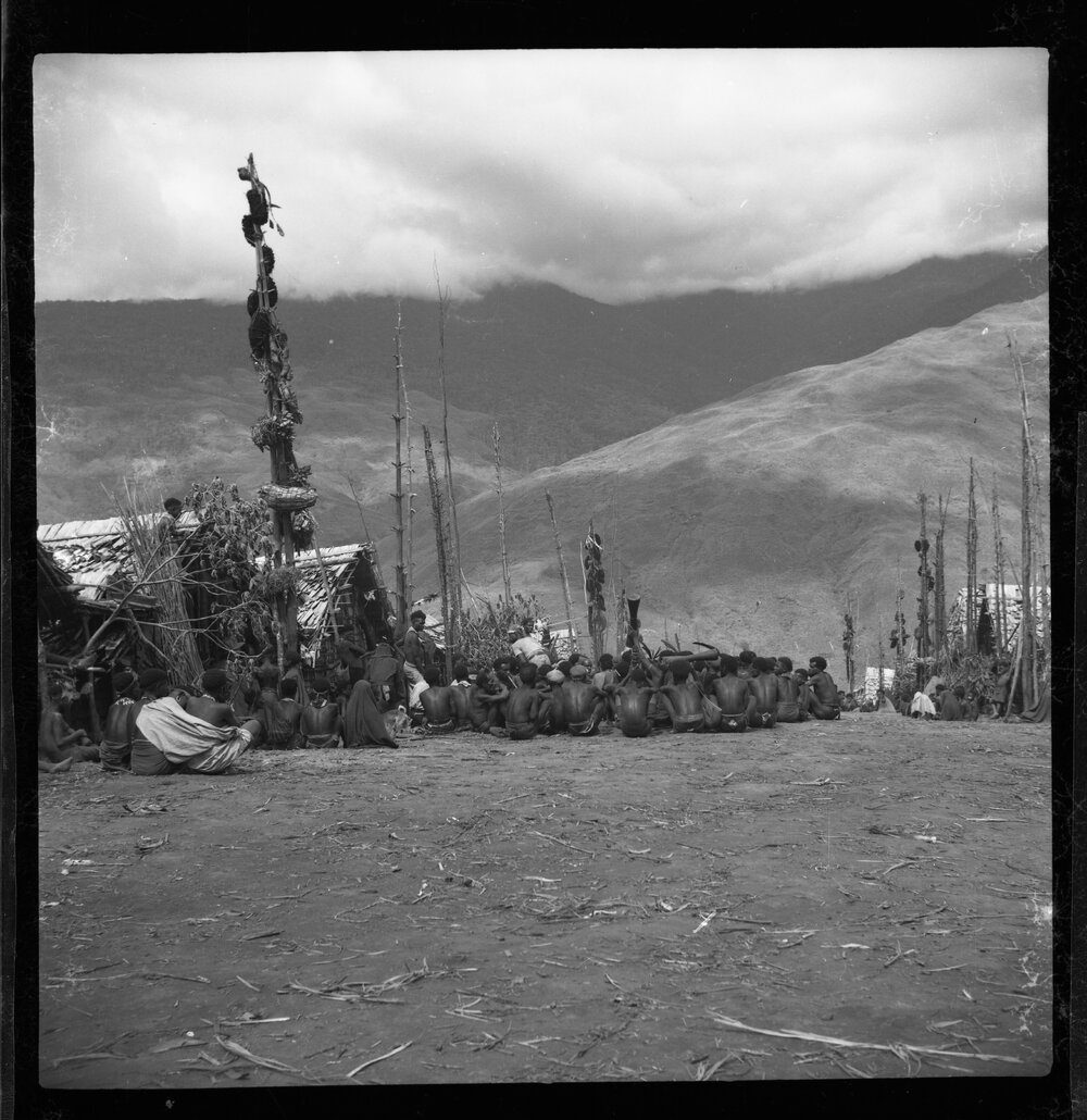 Group Sitting in Mountainside Village