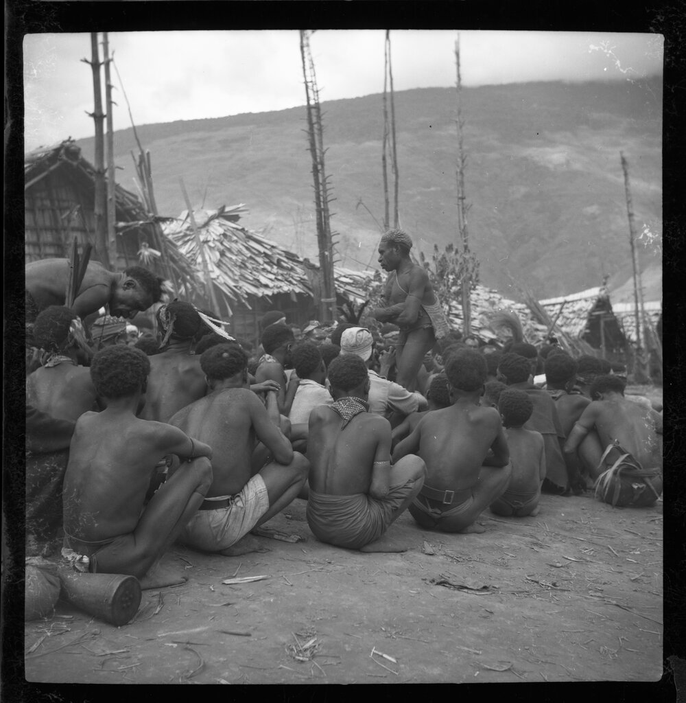 Group Sitting in Mountainside Village
