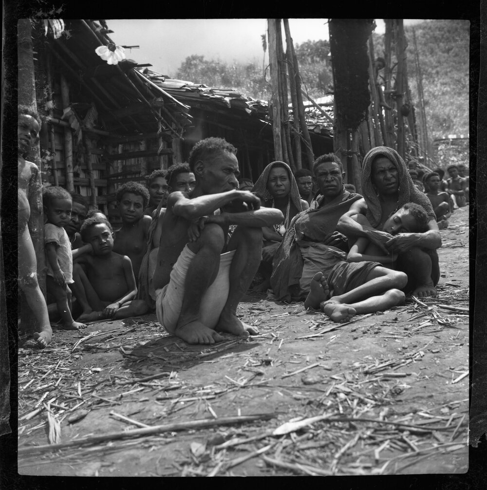 Group Sitting in Mountainside Village