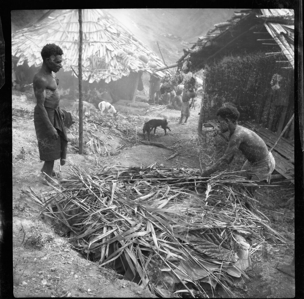 Men Building a Fire