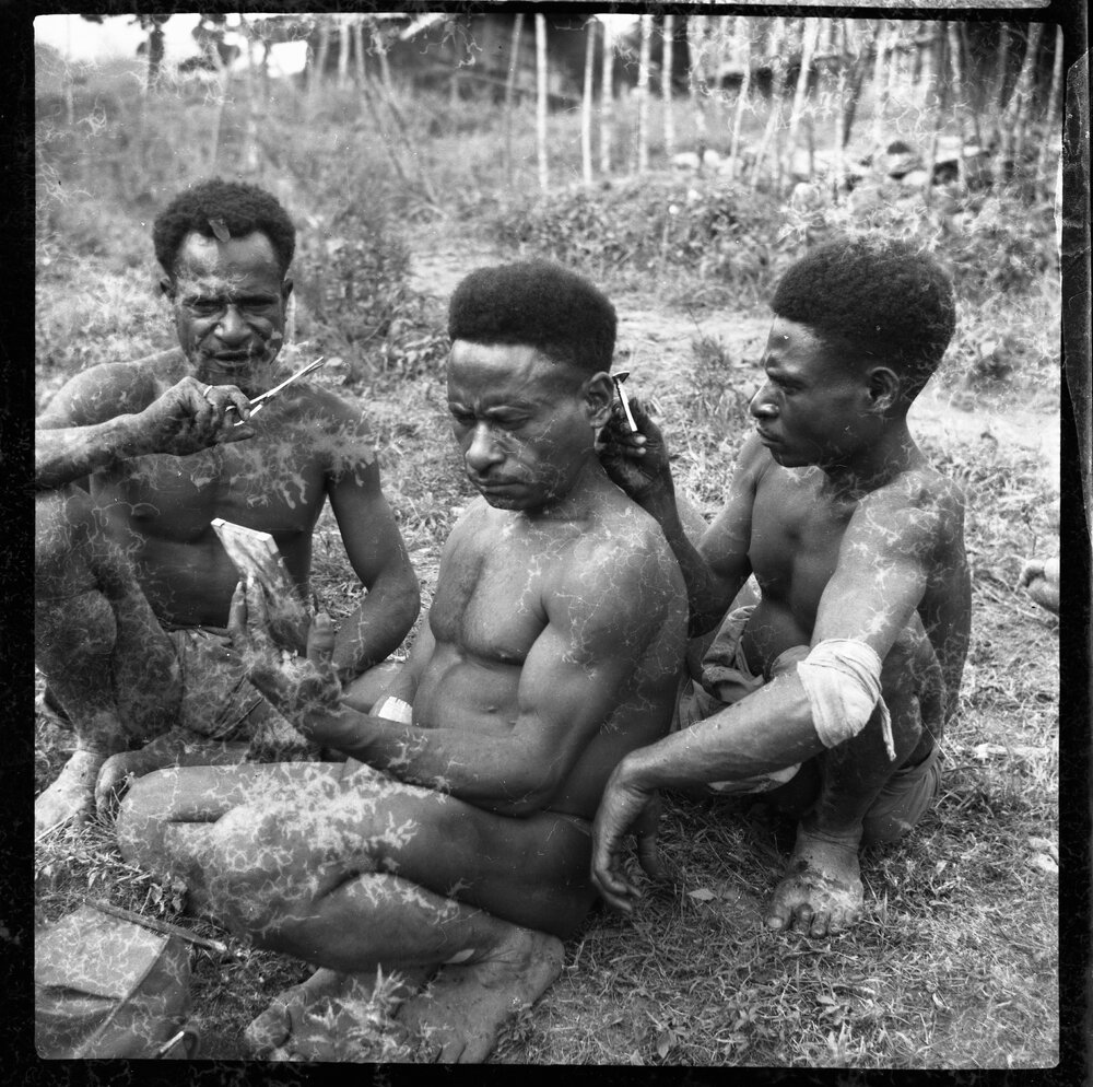 Man Receiving a Haircut