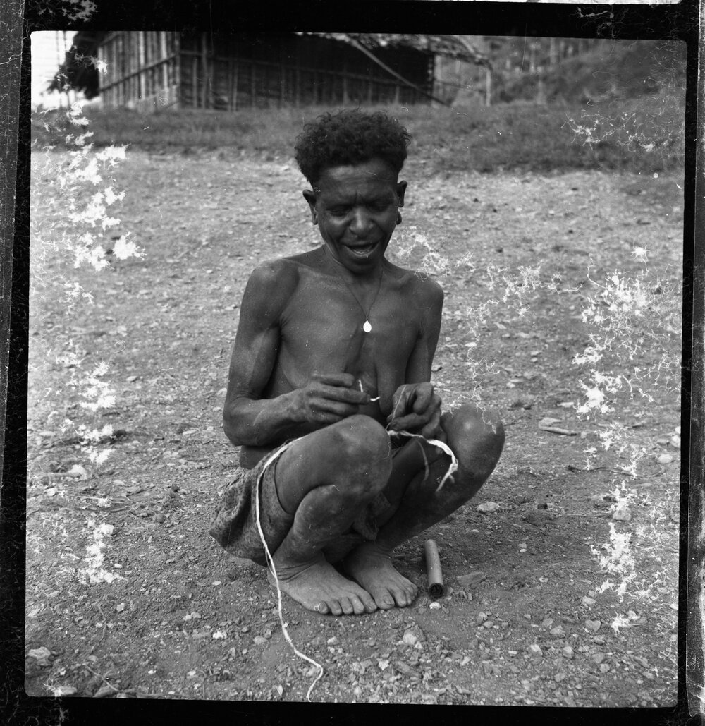 Woman Holding String