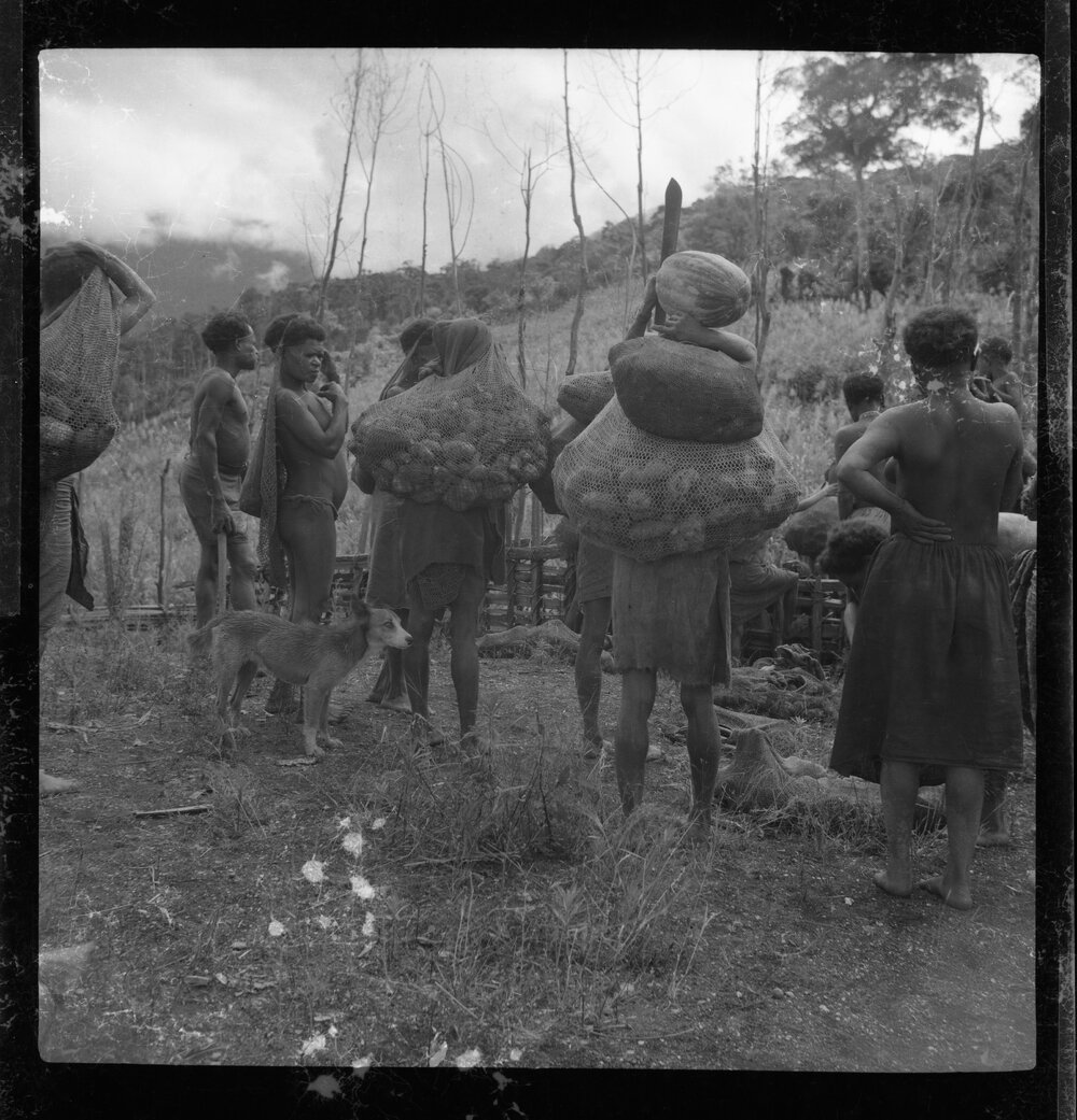 Women Carrying Net Bags