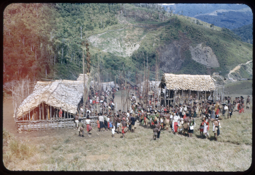Crowds Gathered in a Village