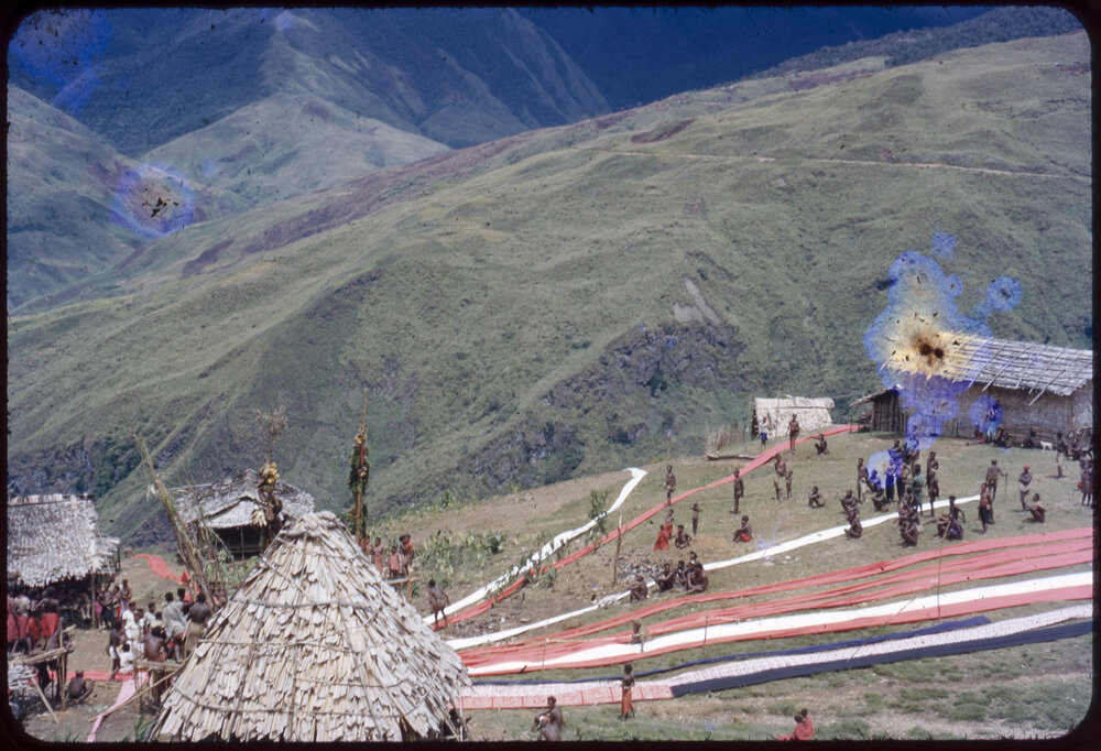 Lengths of Cloth Running Through Mountainside Village