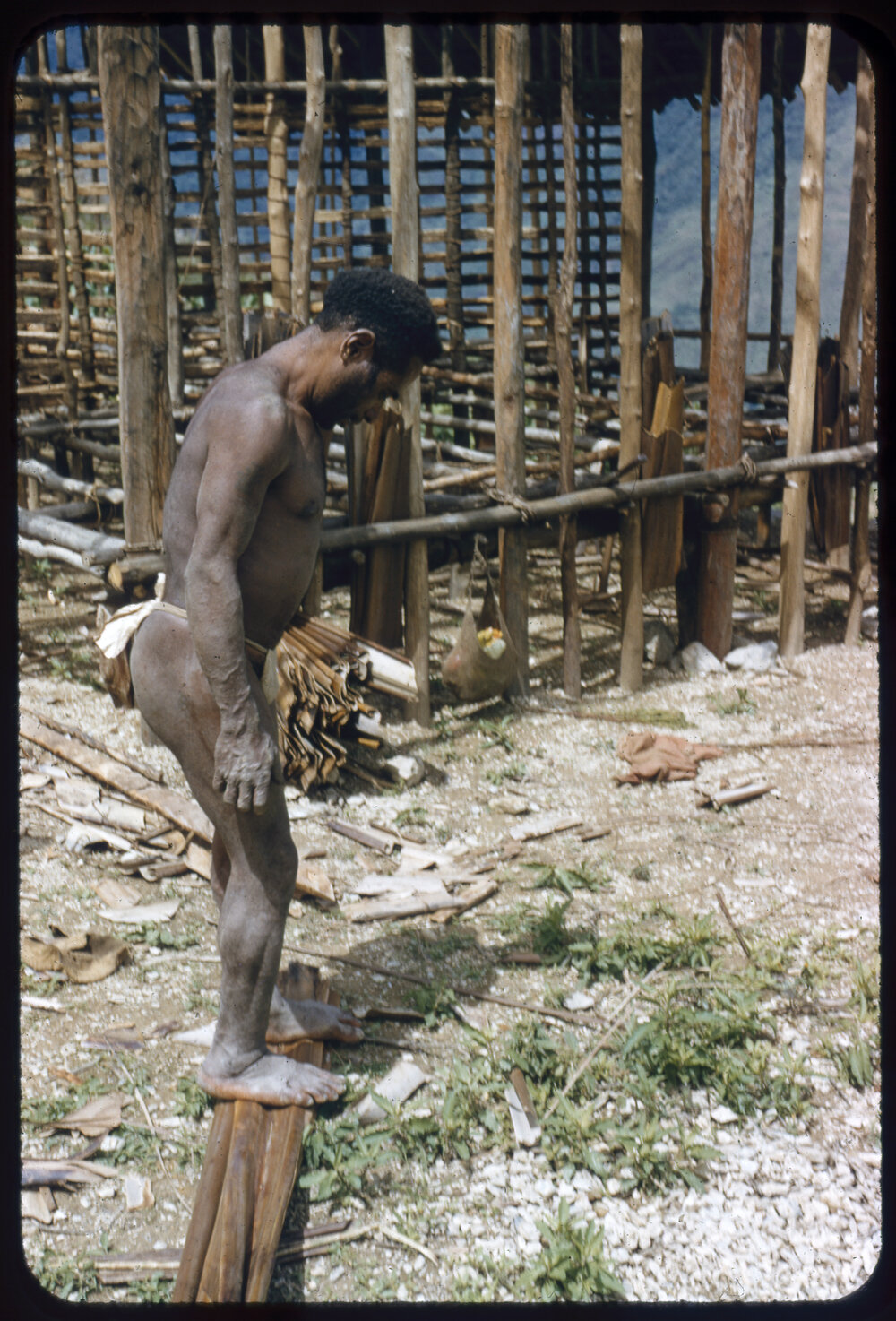 Man Standing Outside Partially Constructed Buildings