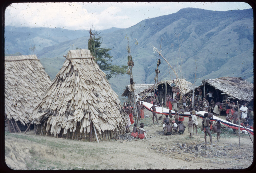 Lengths of Cloth Running Through Mountainside Village