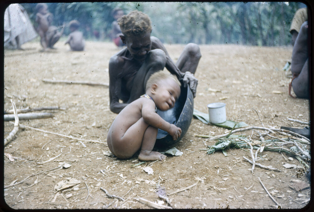 Woman Sitting with a Child