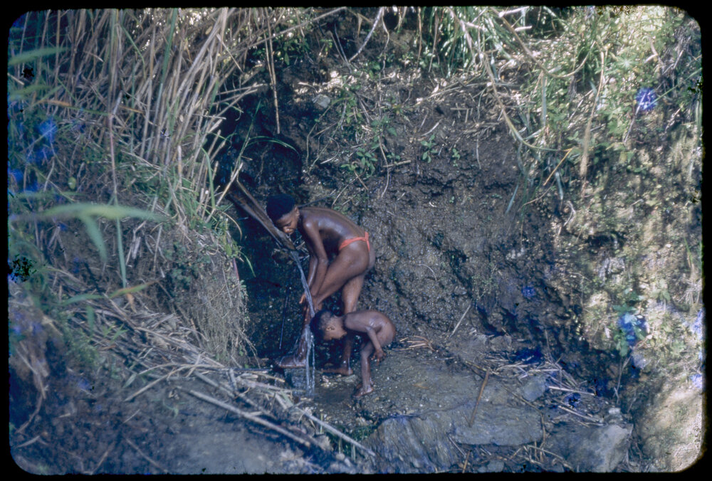 Woman and Child Washing