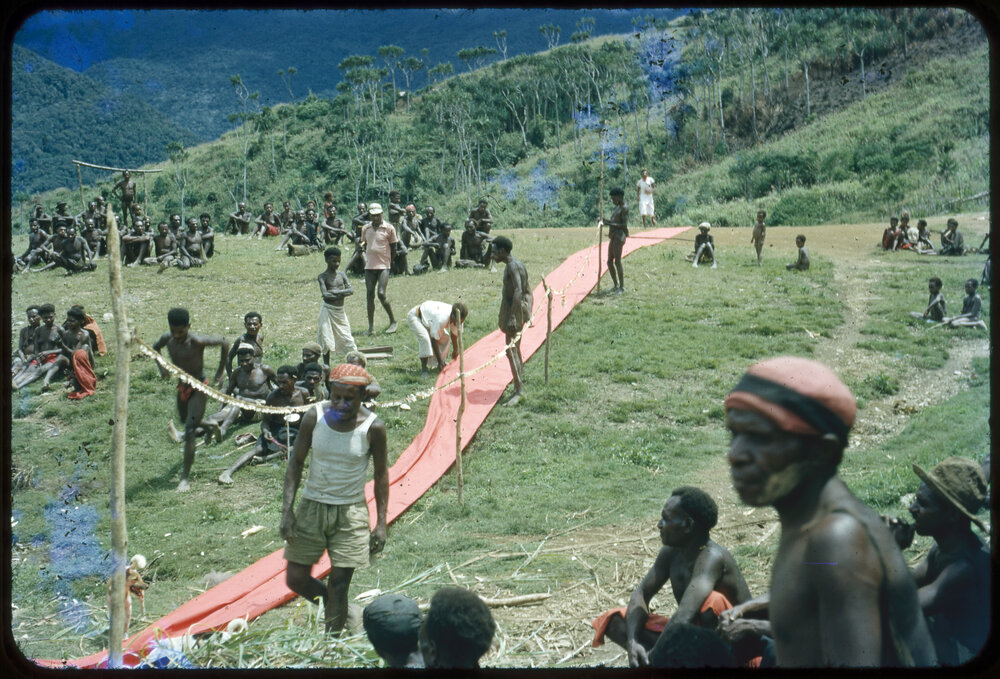 Red Cloth Running Along Ground