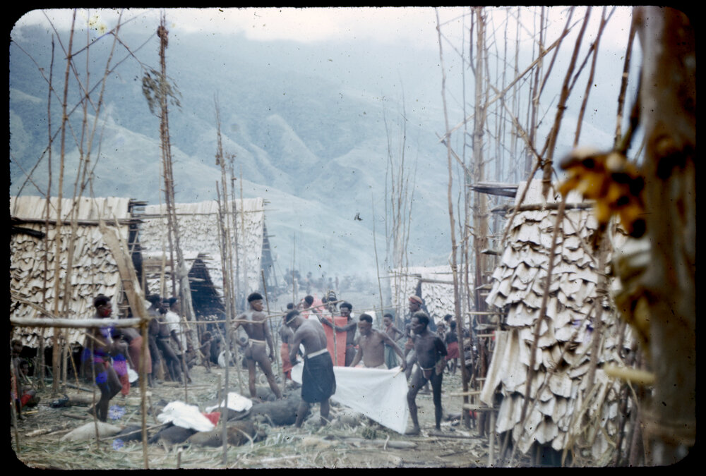 Men Preparing for a Ceremony