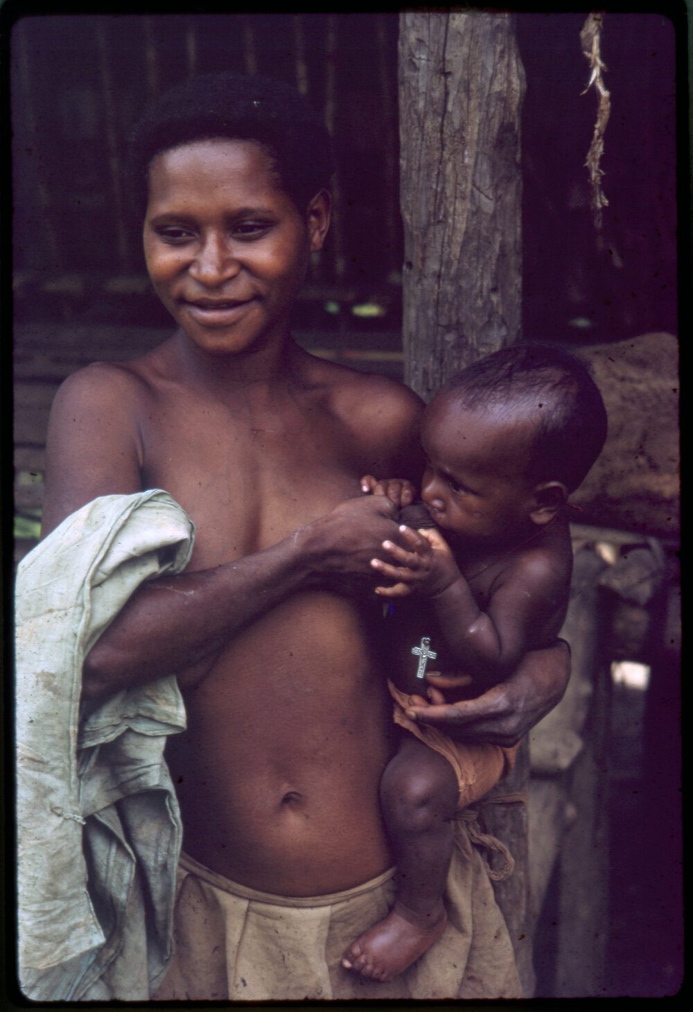 Woman Breastfeeding Child