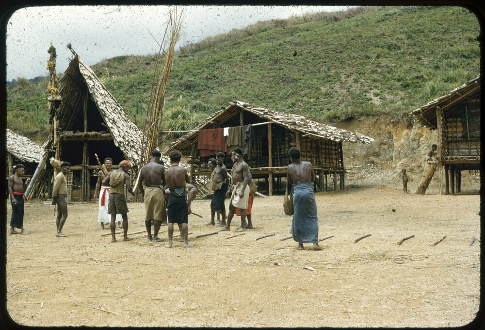Men Gathered Outside Buildings