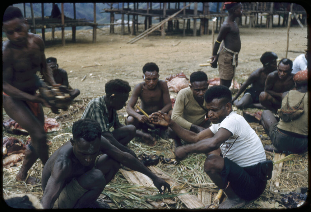 Group of Men Sitting