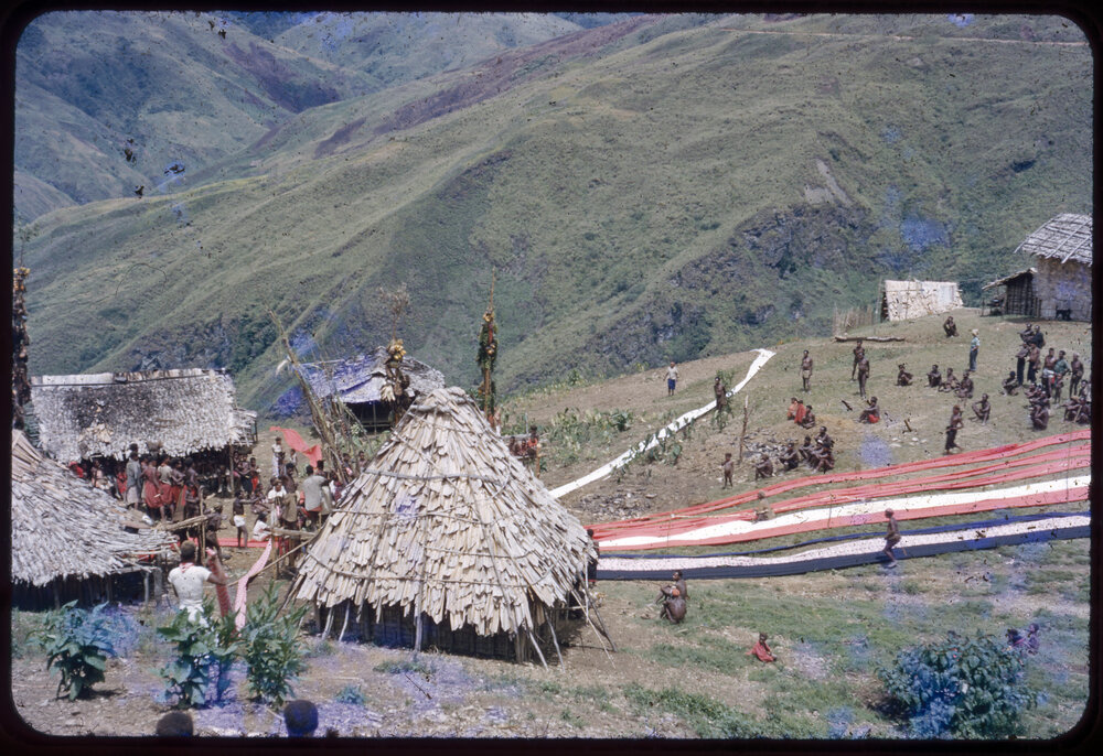 Lengths of Cloth Running Through Mountainside Village