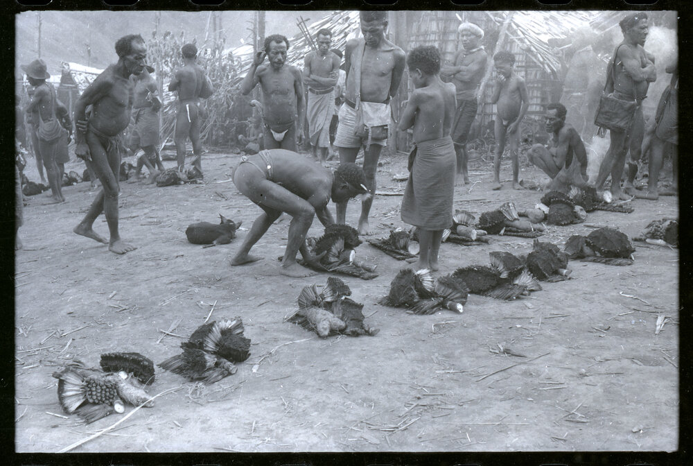 Group Distributing Food for a Ceremony