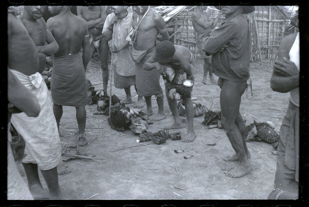 Group Distributing Food for a Ceremony