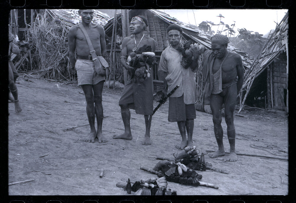 Group Distributing Food for a Ceremony