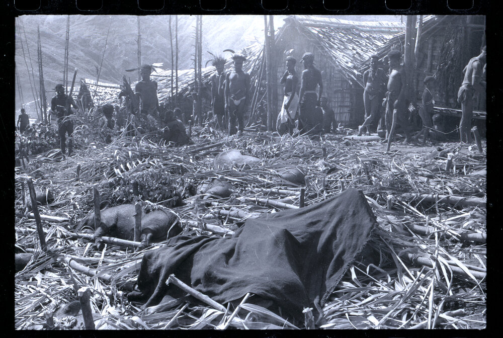 Men Preparing for a Ceremony