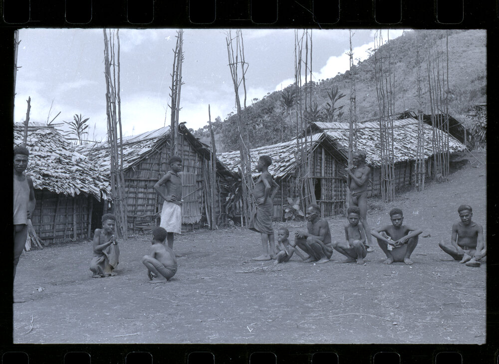 Men and Children in Mountainside Village