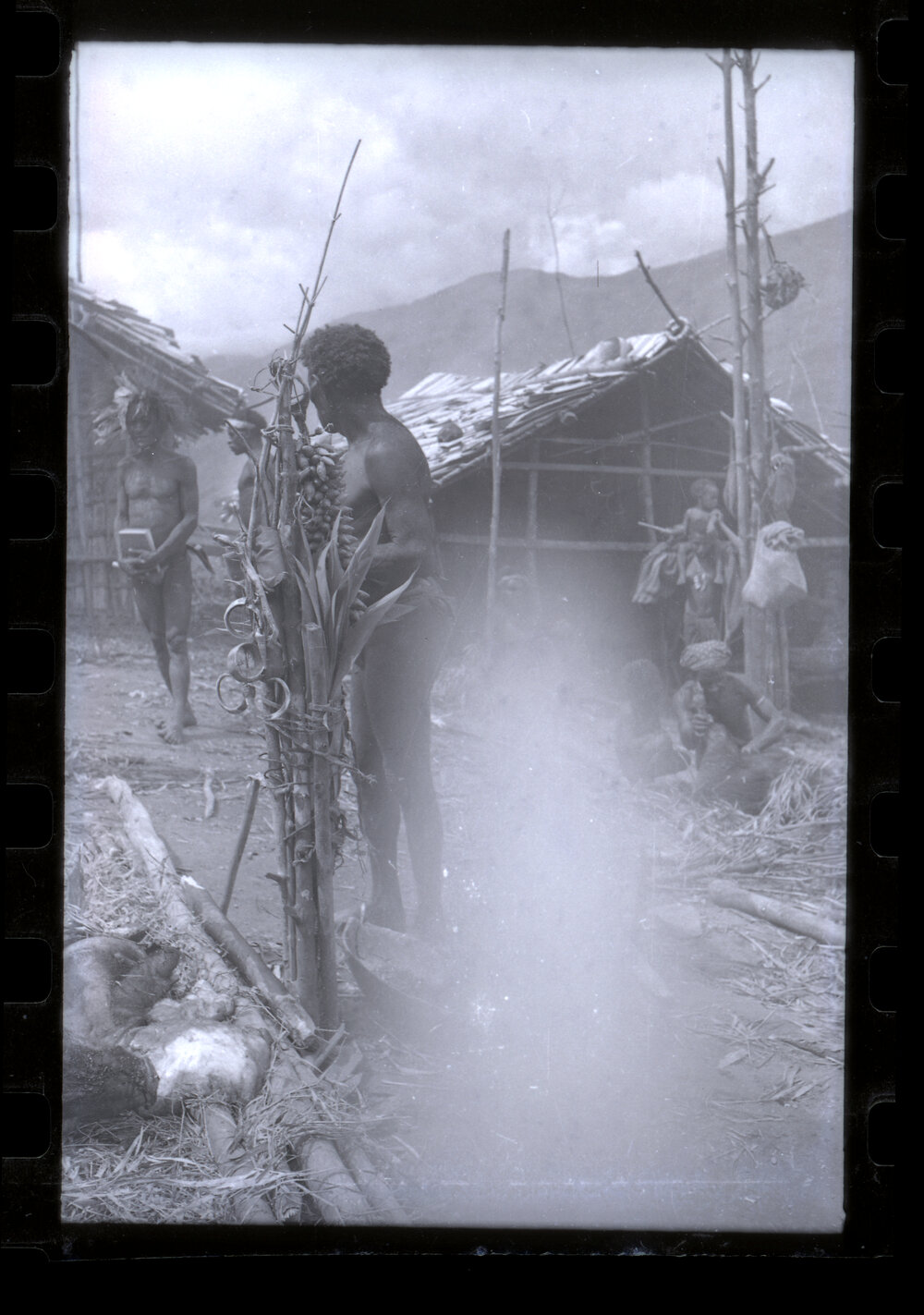Men Preparing for a Ceremony