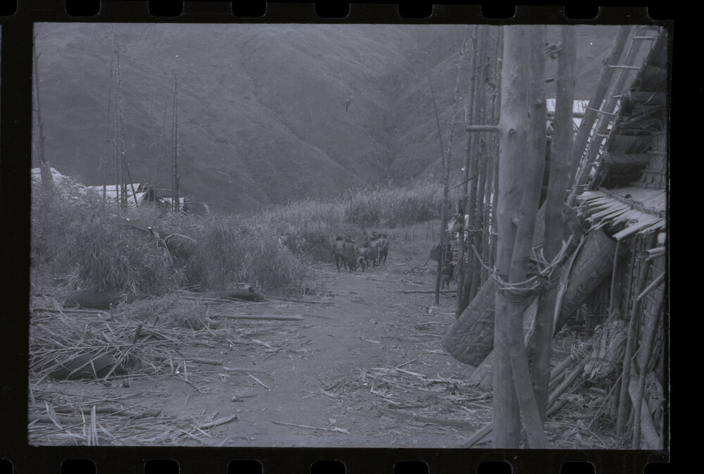 Men Preparing for a Ceremony