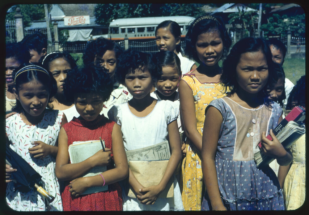 Group of Children Holding Books