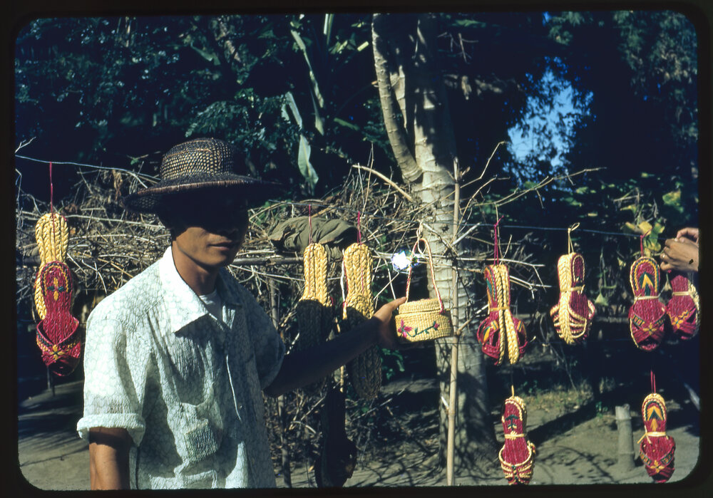 Man with Woven Bags and Shoes
