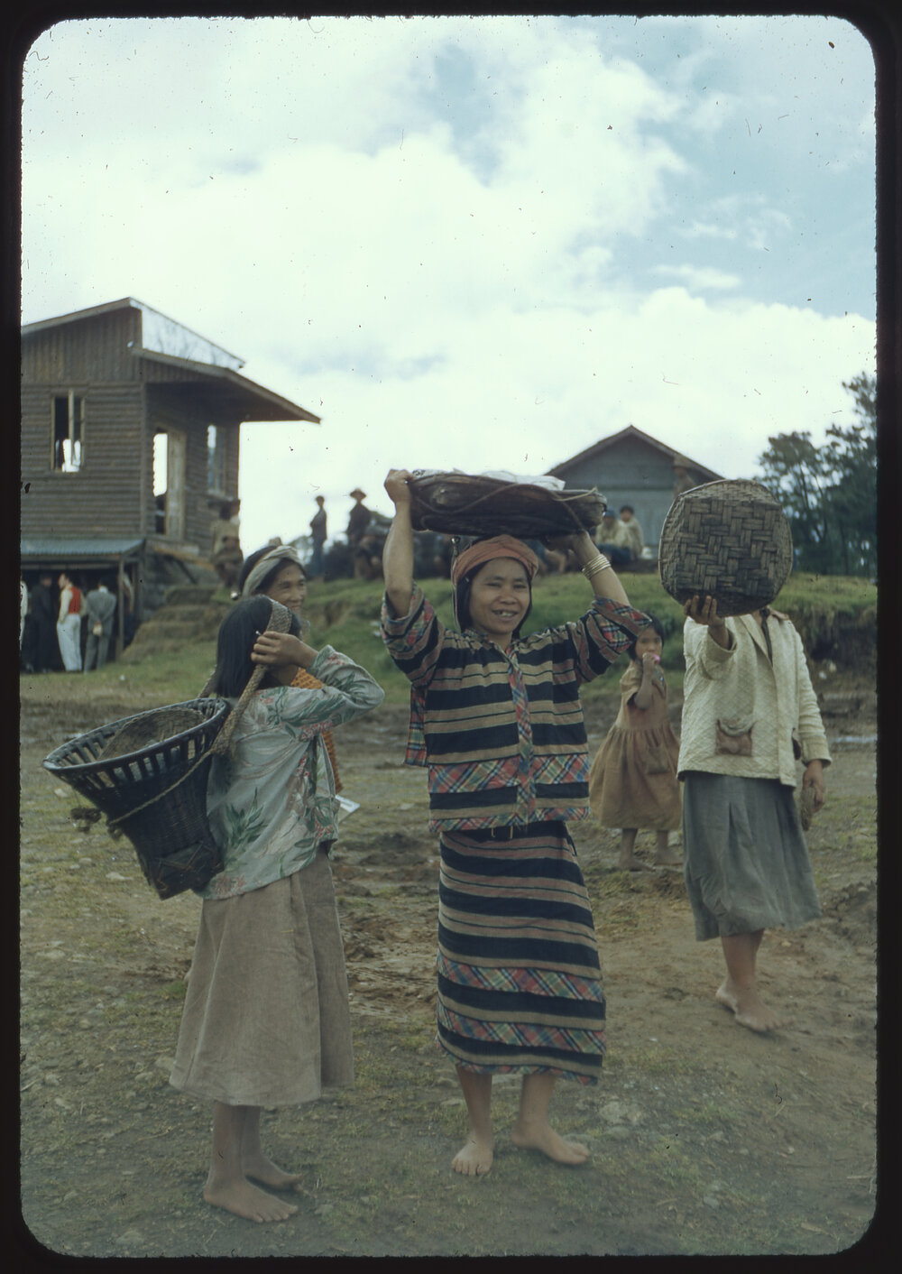 Girls Carrying Baskets
