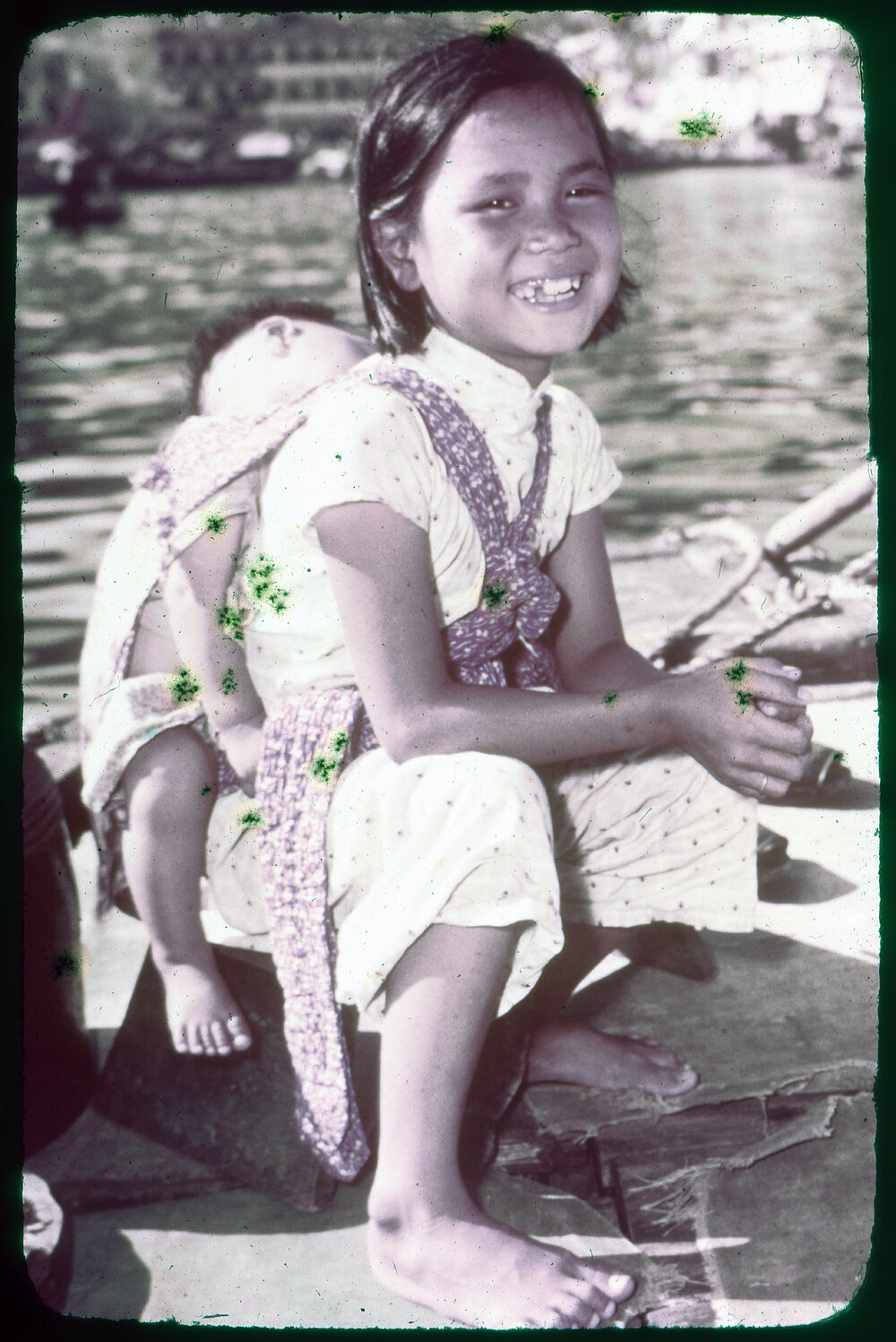 Girl with Baby on her Back
