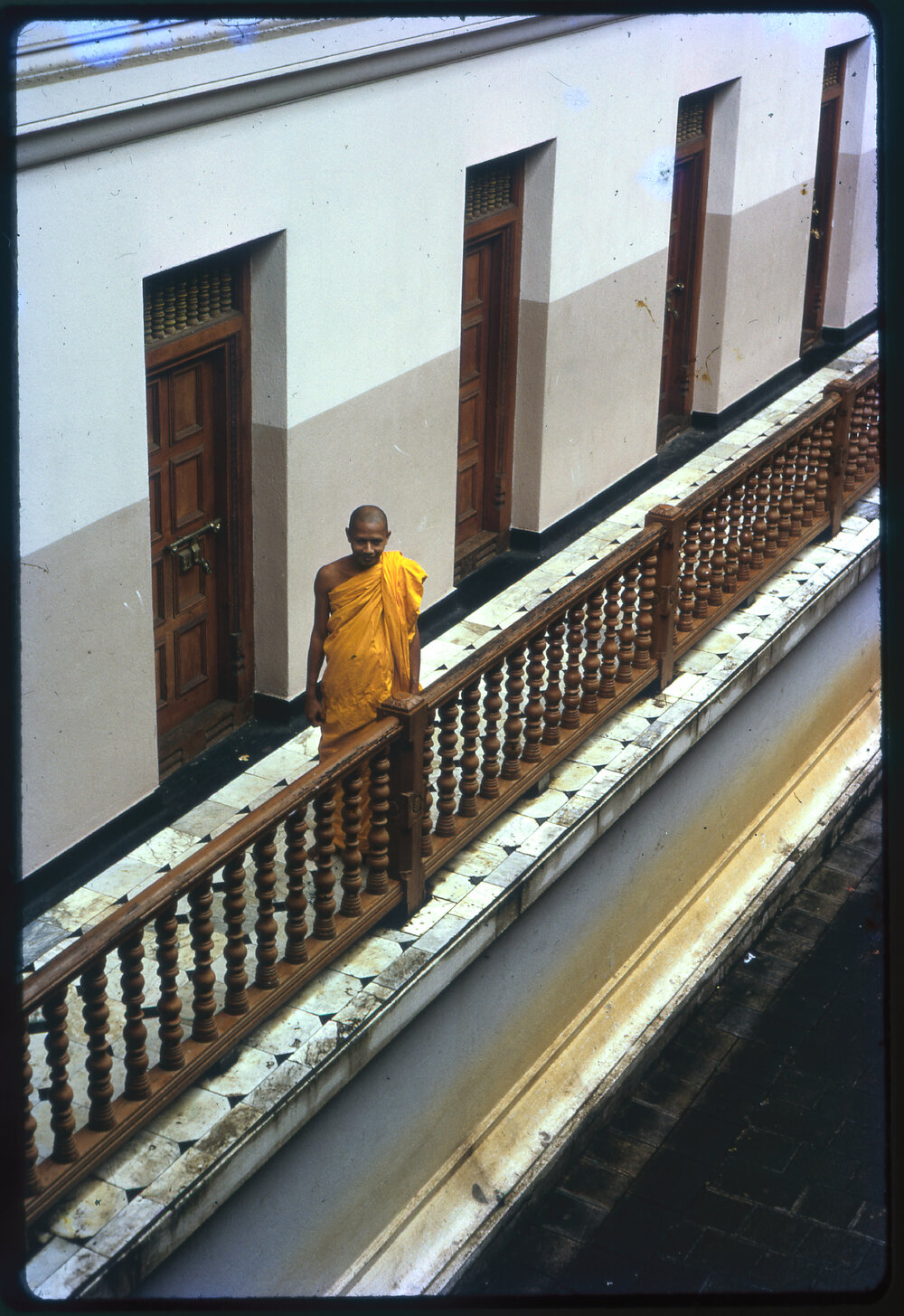 Buddhist Monk on Balcony