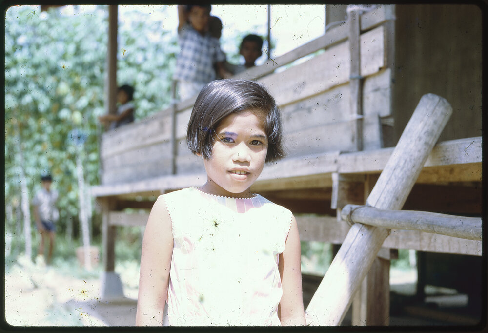 Girl Standing Outside Building