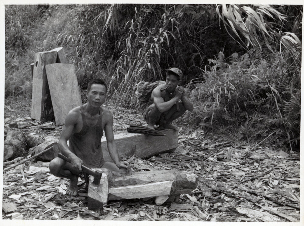 Men Carving Timber