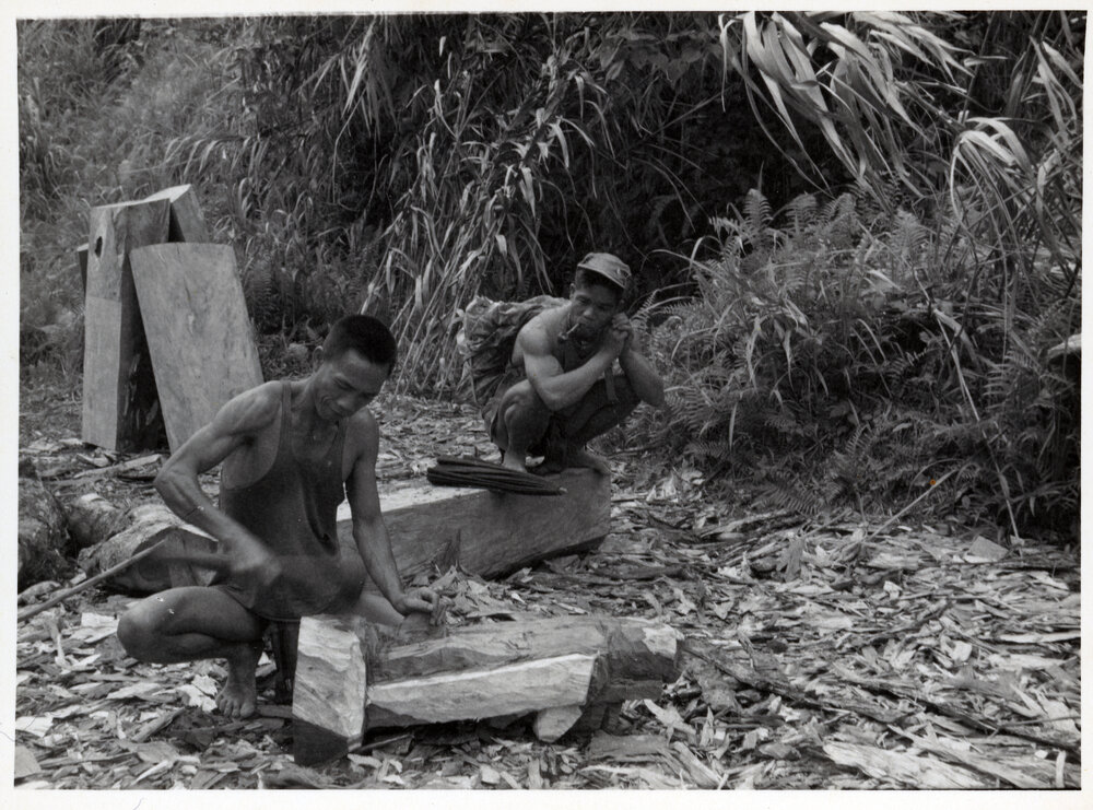 Men Carving Timber