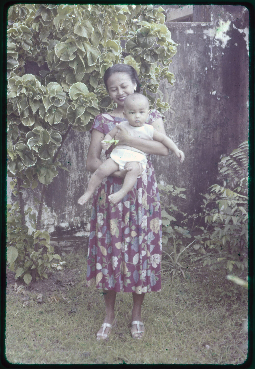 Woman Holding a Baby