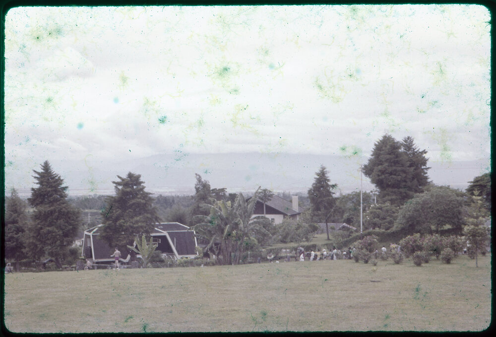 View Across Field with Buildings in Background