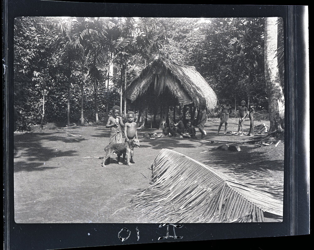 [Manum Island, New Guinea] Maswash, Patipa (Badi&rsquo;s son) and Jock in Badi&rsquo;s homestead