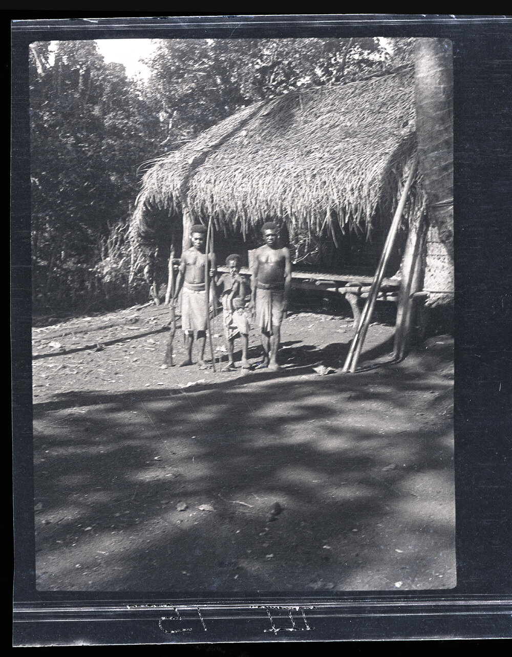 [Manum Island, New Guinea] Joseph, Maswash and Mewo Outside the&rsquo;&rsquo;House Kiap&rdquo; at Tsogari