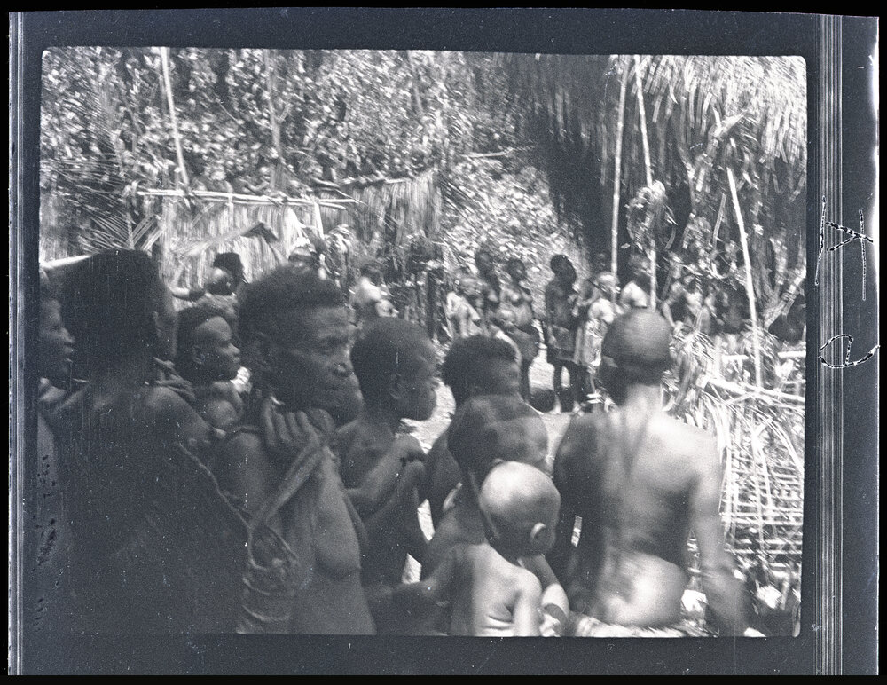 [Manum Island, New Guinea] Removing the Food