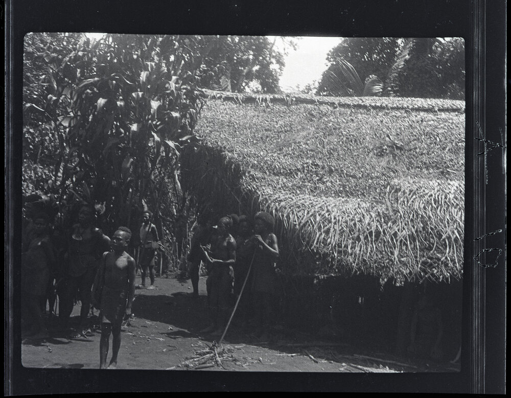 [Manum Island, New Guinea] Removing the Food
