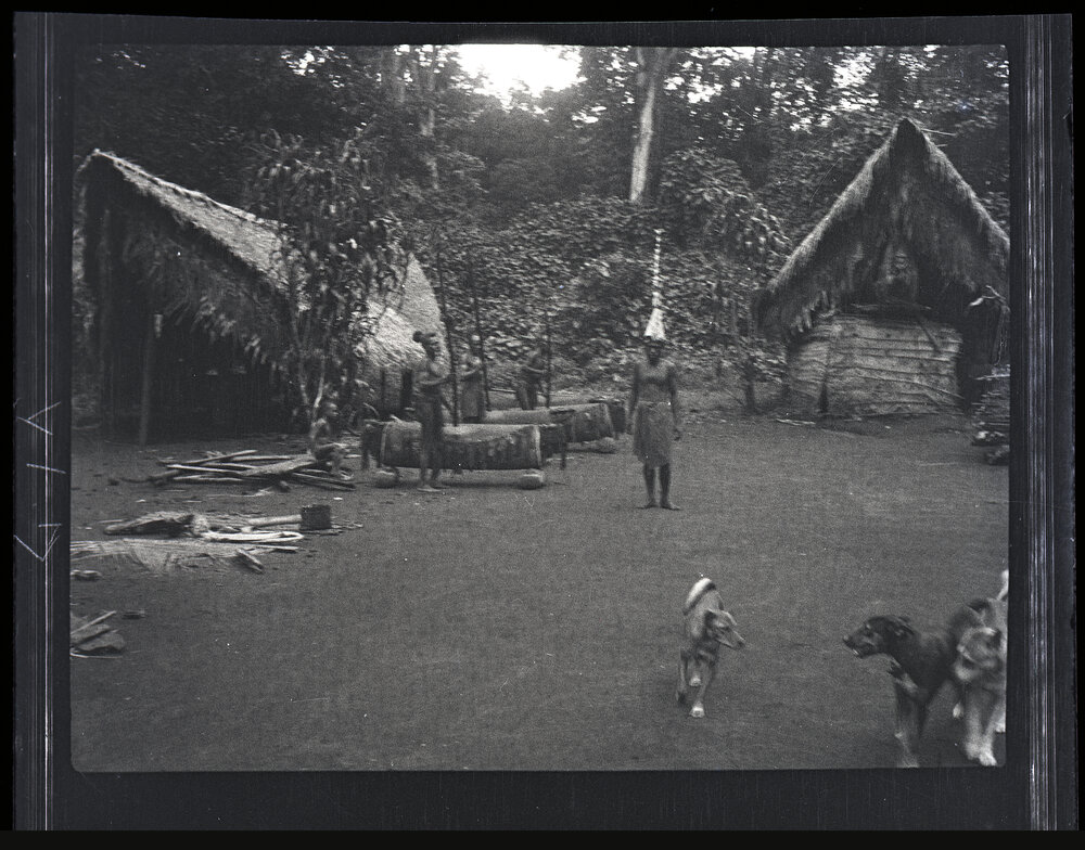 [Manum Island, New Guinea] Men Beating the Gongs to Encourage &rsquo;Ombia to Dance