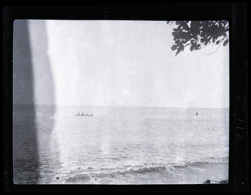 [Manum Island, New Guinea] Canoes Going out to get Crabs Carried by the Flotsam Brought Down from the Mainland Rivers