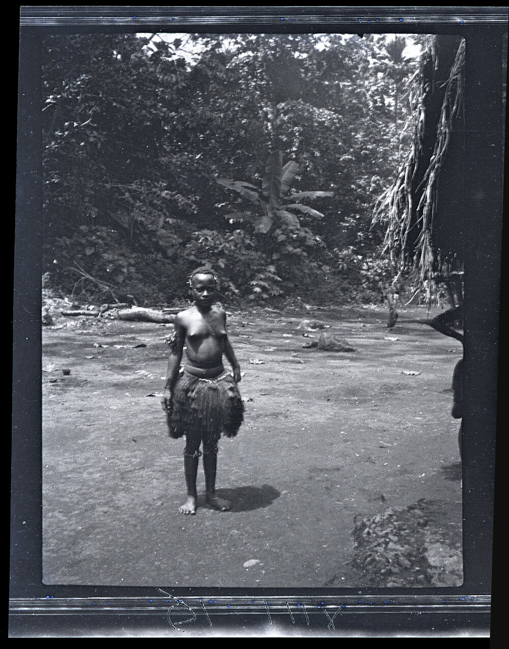 [Manum Island, New Guinea] Wazike, Daughter of Basi, Showing the Ornaments put on at her &rdquo;Coming of Age"