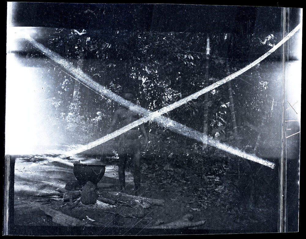 [Manum Island, New Guinea] Tou Stirring a Pot Containing Dye for Petticoats