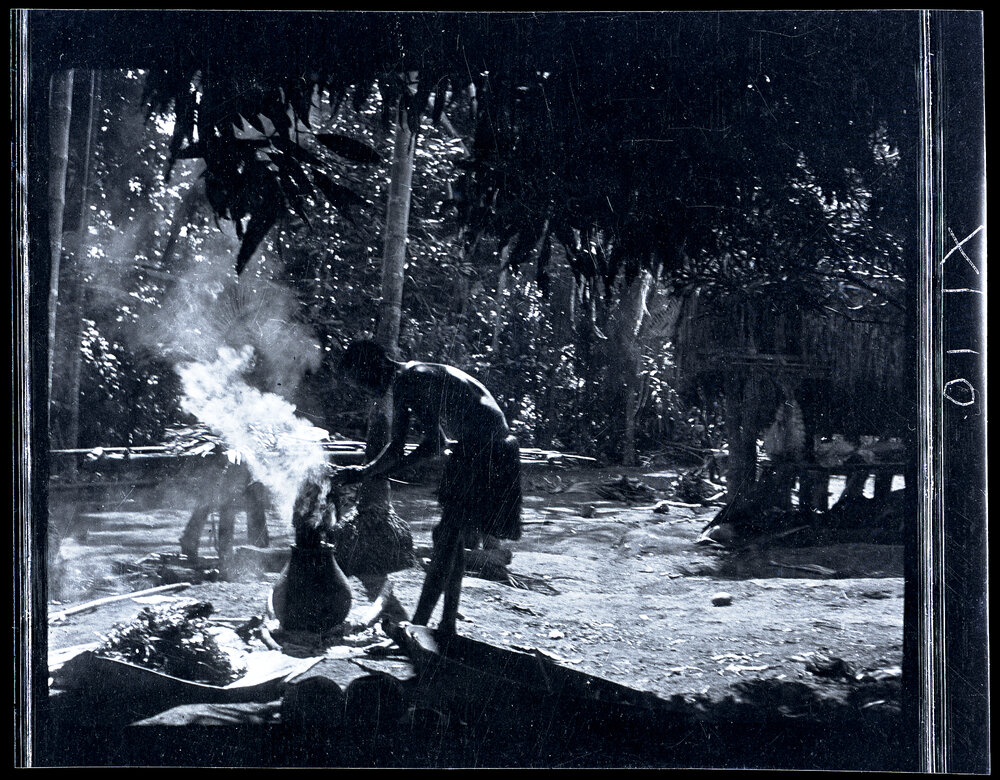 [Manum Island, New Guinea] Moinzo Removing a Petticoat from the Dye