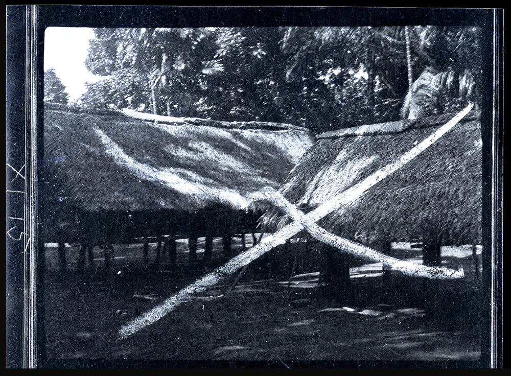 [Manum Island, New Guinea] A Dyed Petticoat Drying on the Roof