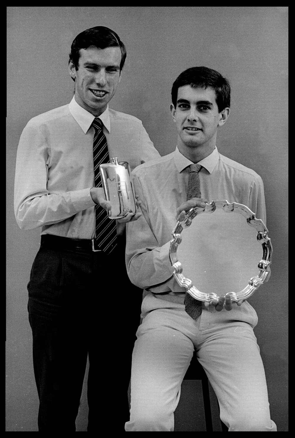 Ashley Black and Bruce Meagher with World University Debating Championship Trophies