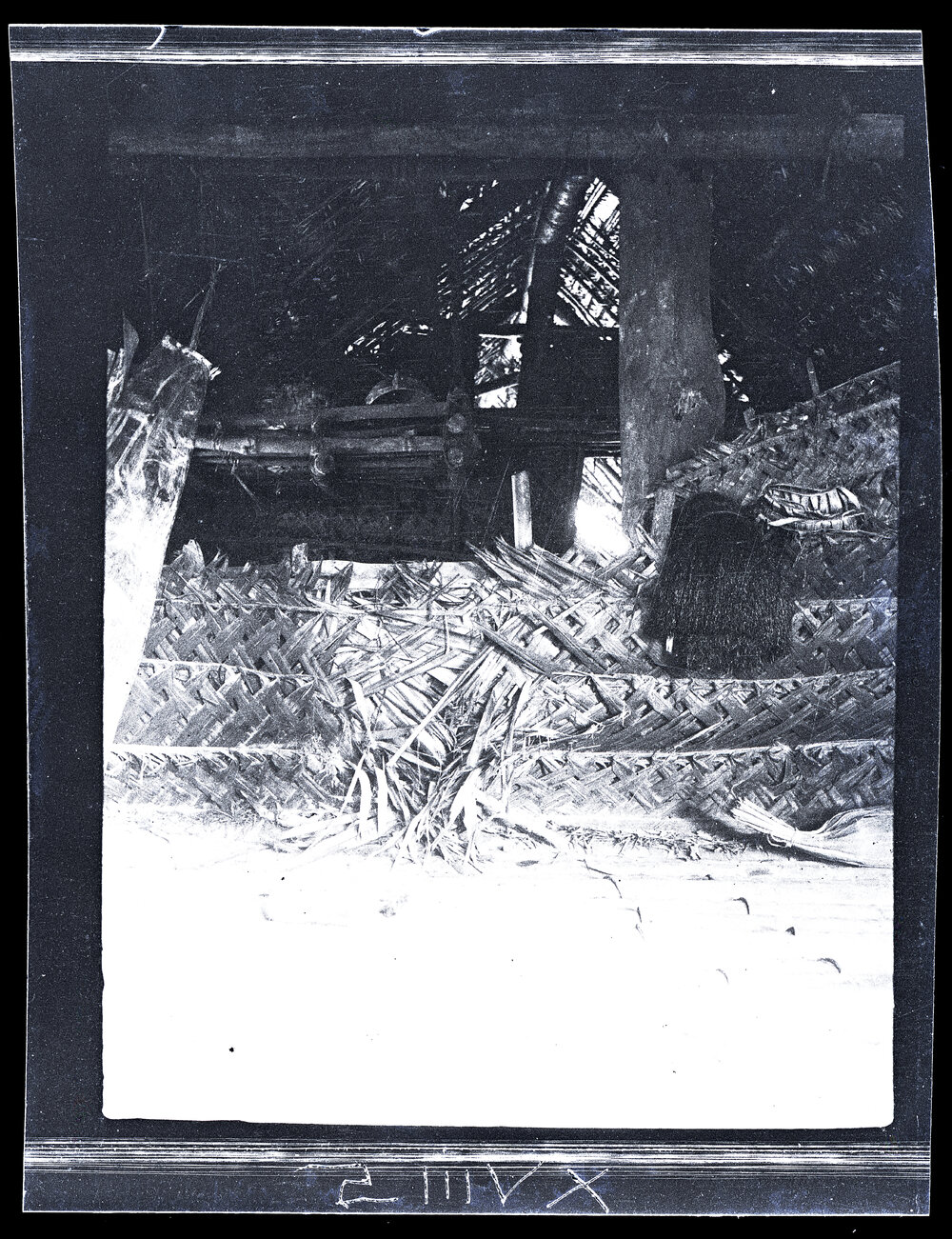 [Manum Island, New Guinea] The Inside of Aupo&rsquo;s House Showing the Central Parti&shy;tion Wall